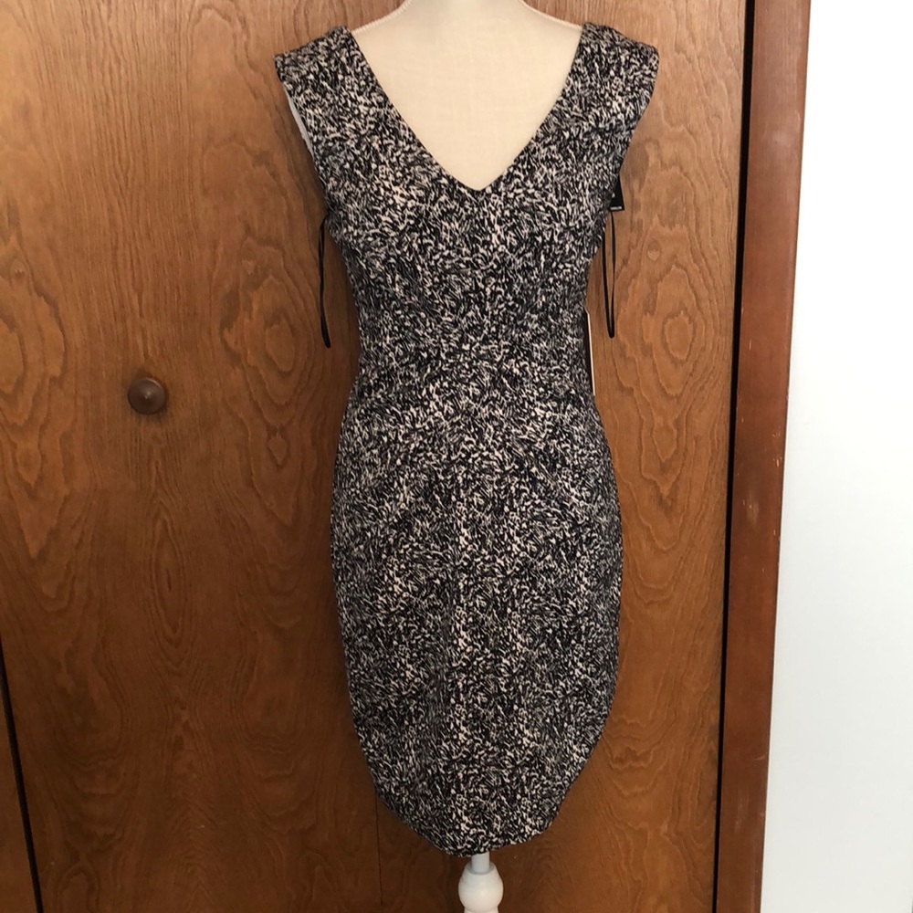 Fun black + white patterned business-casual dress with back zipper. Size 6. NWT